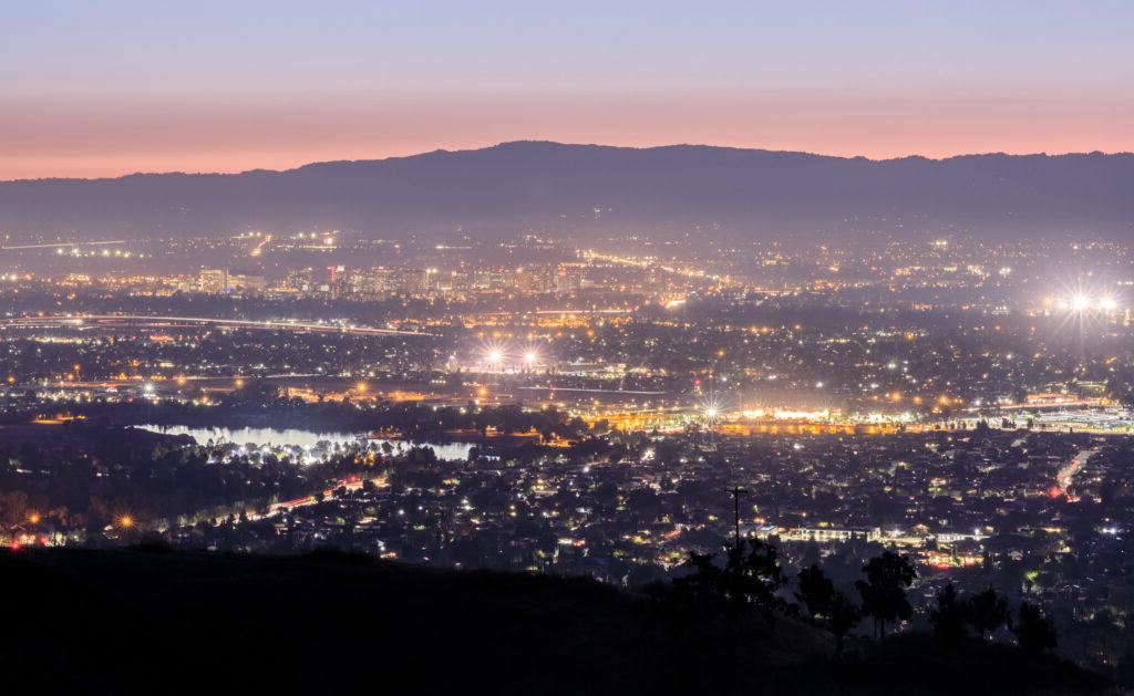 Silicon Valley at dusk with lots of lights.